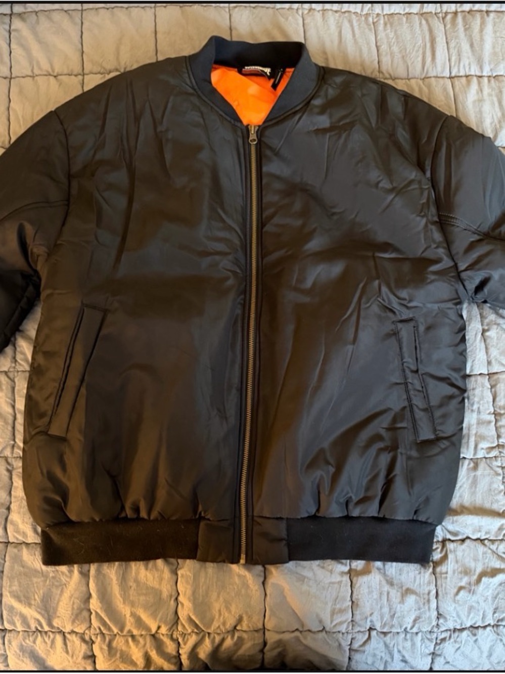 Reclaimed Vintage Black Bomber Jacket with Orange Lining